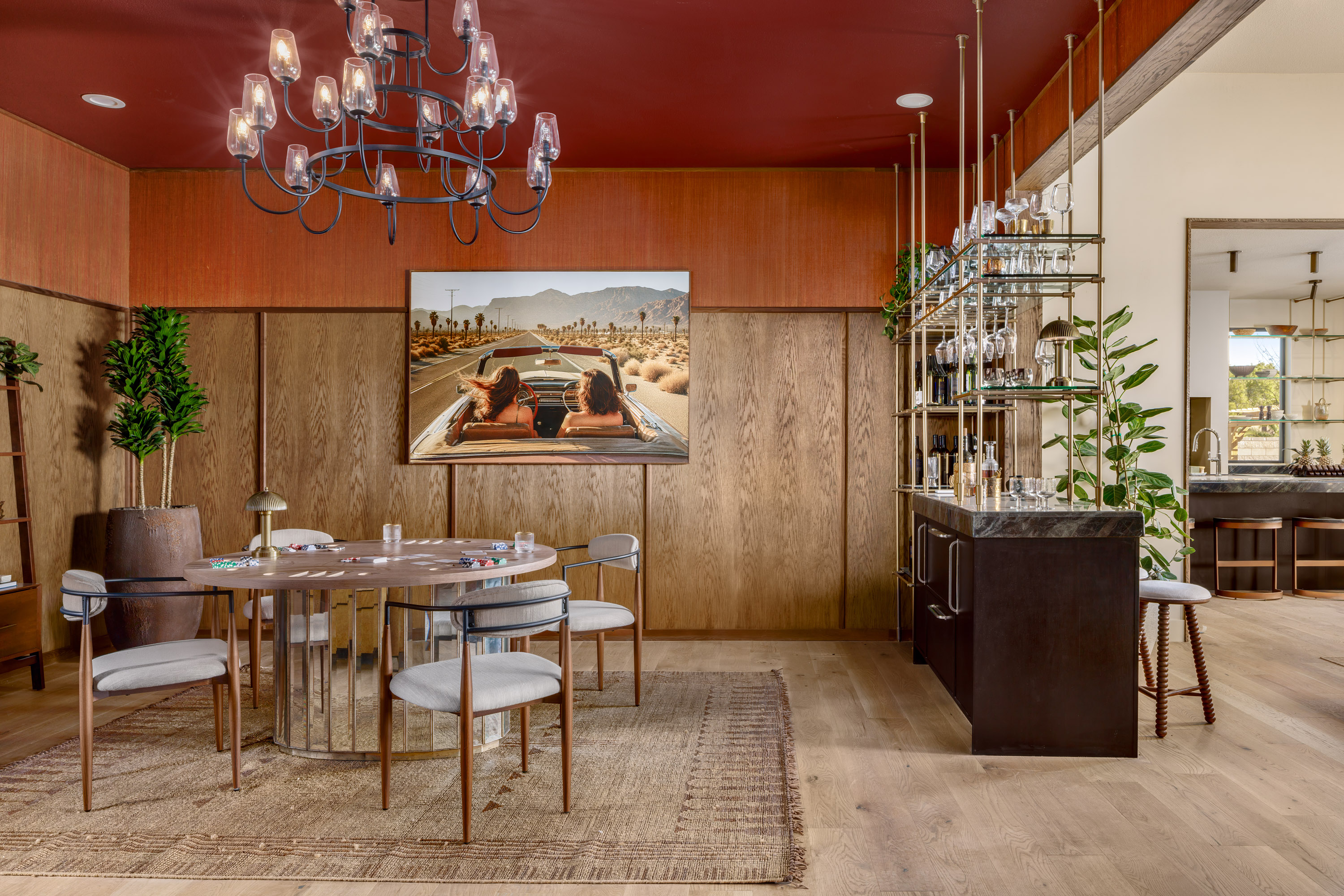 Dining space with upholstered chairs in a warm, earthy palette