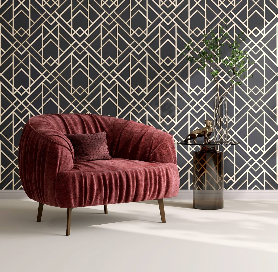 Maroon red pleated velvet fabric cushion armchair, wooden leg, glass side table in sunlight on black geometric pattern wallpaper wall, beige floor living room for lifestyle, interior design decoration background 3D